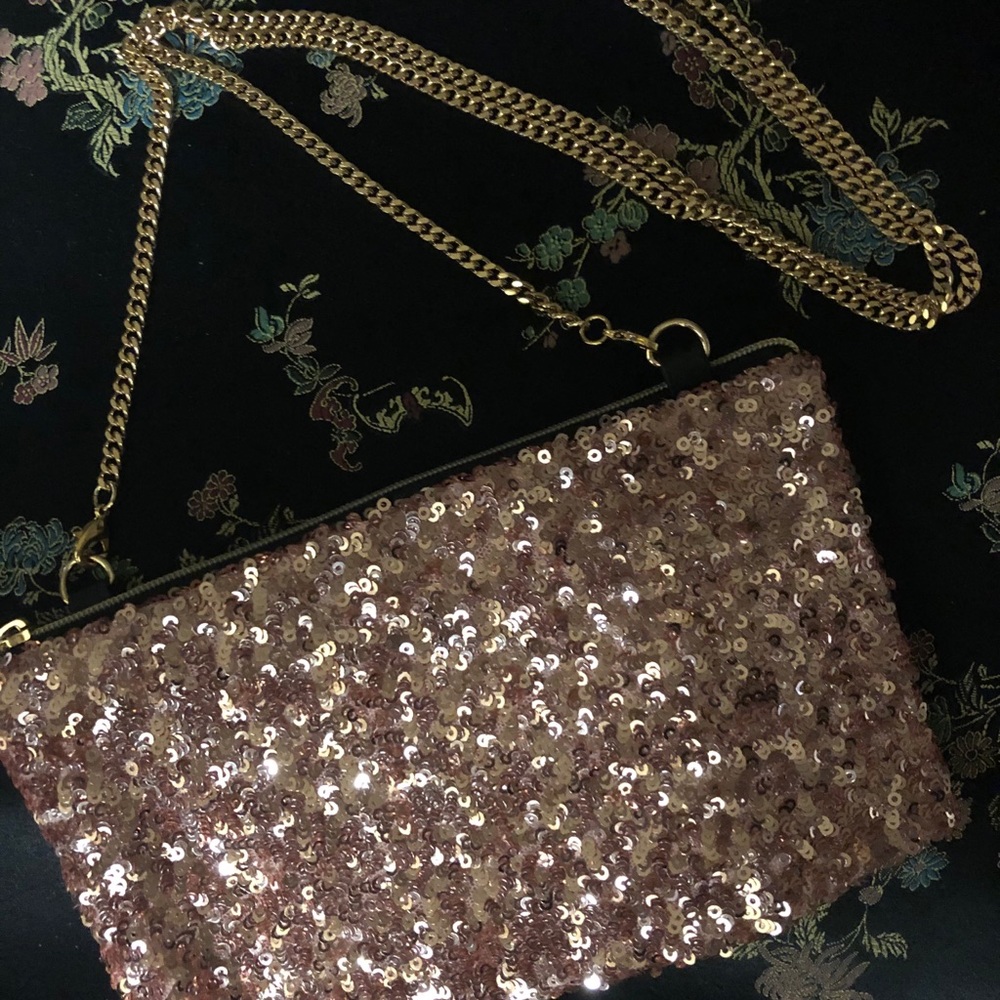 Miyaki handbag with long shoulder strap. Sharp!